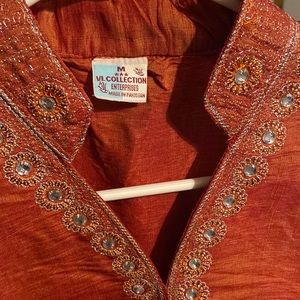 Beautiful Burnt Orange Embroidered Top with splits on each side size medium